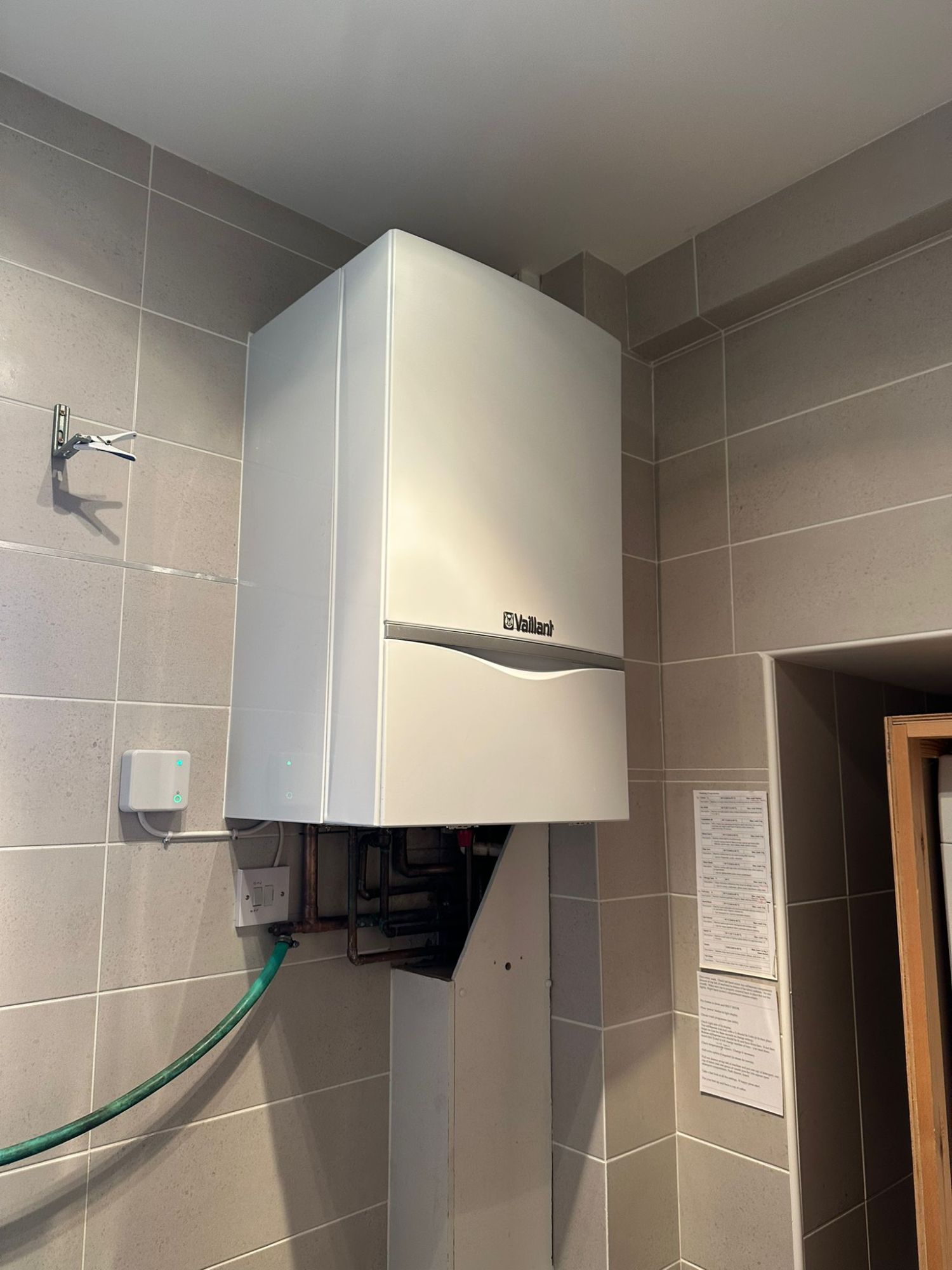 Vaillant boiler installation in a tiled utility room